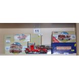 An assortment of boxed limited edition die-cast scale models, including American Ladder Truck,