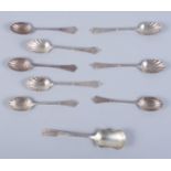 Two sets of four silver teaspoons, each with shell formed bowls, and a silver sugar scoop, 3.8oz