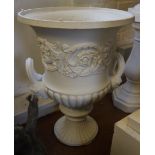 A cast iron two-handle campagna urn, 28" high, and a cast stone base, 17" high