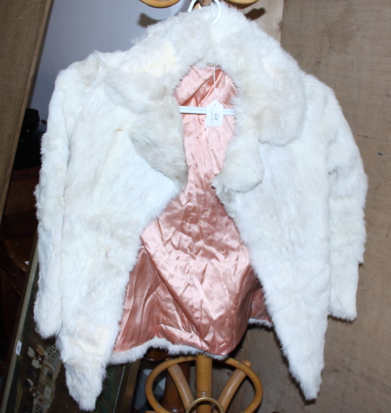 A white coney fur coat, size 14, back 29" long
