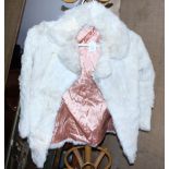 A white coney fur coat, size 14, back 29" long