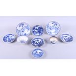A set of four 19th century Chinese blue and white "Willow" pattern saucer dishes and other 19th
