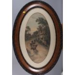 A pair of early 20th century colour prints, landscapes, in oval grained as oak frames