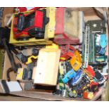 A collection of tin-plate toys, including a Tonka truck, a Tonka T-6 digger and various others by