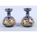 A pair of Doulton Lambeth baluster vases with leaf and berry decoration, 5 1/2" high