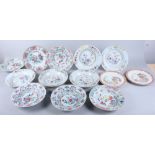Five 19th century Chinese exportware porcelain plates, enamelled with floral decoration, together