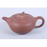 A Chinese terracotta Yixing teapot, 4" high