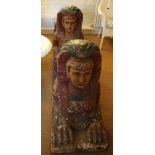 A pair of 19th century carved wooden painted sphinx, each on plinth bases, 42" x 31"