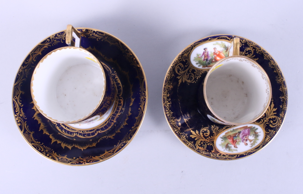 Two Vienna porcelain coffee cans and saucers decorated figures on a blue ground with gilt - Image 6 of 18