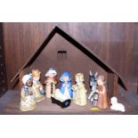 A Hummel nativity set, complete with wooden stable
