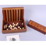 A walnut and satinwood banded boxed game, "The Captain's Mistress", and a mahogany and inlaid