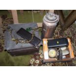 A collection of metalware and other items, including a copper fire extinguisher, a typewriter, cased