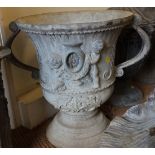 A cast lead two-handle urn of 17th century design, 17" high
