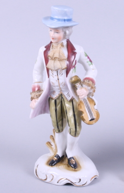 A Continental figure of a boy holding a conch shell, a similar figure of a gentleman with a fiddle - Image 2 of 8