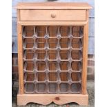 A pine wine rack, fitted one drawer, 23" wide
