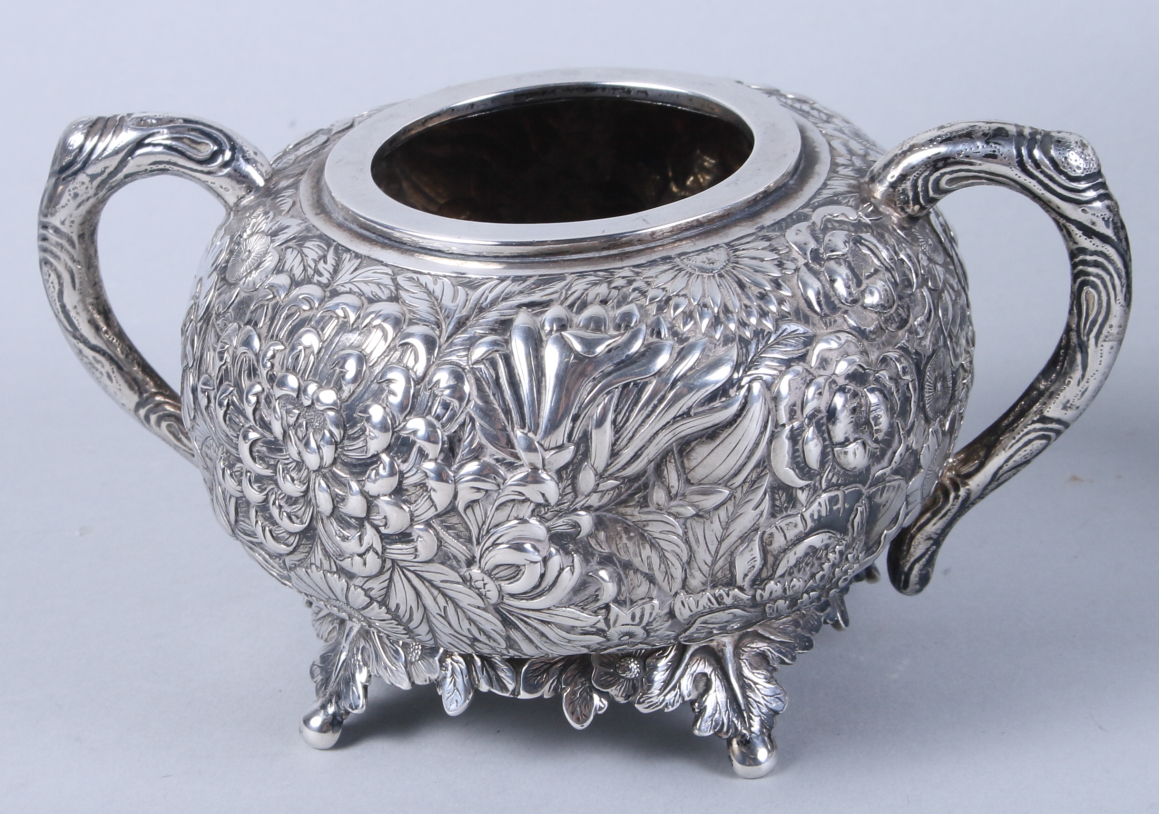 An early 20th century Chinese silver three-piece teaset, by Wang Hing, with embossed all-over floral - Image 2 of 13