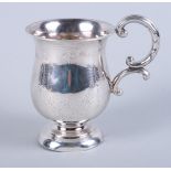 A late Victorian silver Christening mug, engraved with floral leaf decoration, on circular foot, 3.