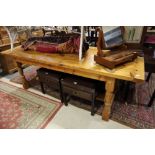 A mid 20th century pine plank top dining table, on trestle and 'H' stretcher supports, 89" x 32 1/2"