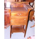 A late 19th century drop centre washstand, fitted drawer and cupboard over underteir, 27" wide