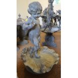 A cast lead bird bath with standing putto, 24" high