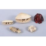 An okimono, formed as a shell with figures, 3" wide, a smaller similar okimono, two fish netsuke and