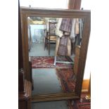 A gilt framed wall mirror, plate 24" x 39"