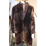A mid 20th century full length shearling fur coat