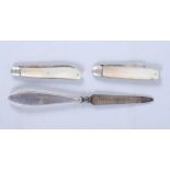 Two folding fruit knives with silver blades and mother-of-pearl handles and a silver-handled nail