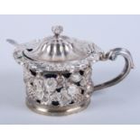 A Victorian silver drum salt with cast vine and floral pierced decoration, and a George V silver