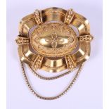 A late 19th century yellow metal brooch with beaded Etruscan decoration, 2" long, 15g