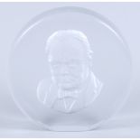 A mid 20th century frosted glass paperweight of Winston Churchill, by R Strand, 5 3/4" dia
