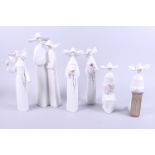 A Lladro figure group of two nuns, 13" high, and five other Lladro figures of nuns in various