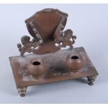 A bronze desk inkstand, inscribed SS Arrachan 1914, 8" wide