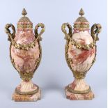 A pair of 19th century pink marble and ormolu mounted urns with swag decoration, bases marked Jollet