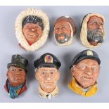 A group of six Bossons Congleton painted plaster busts, and a wooden cased steel pocket corkscrew