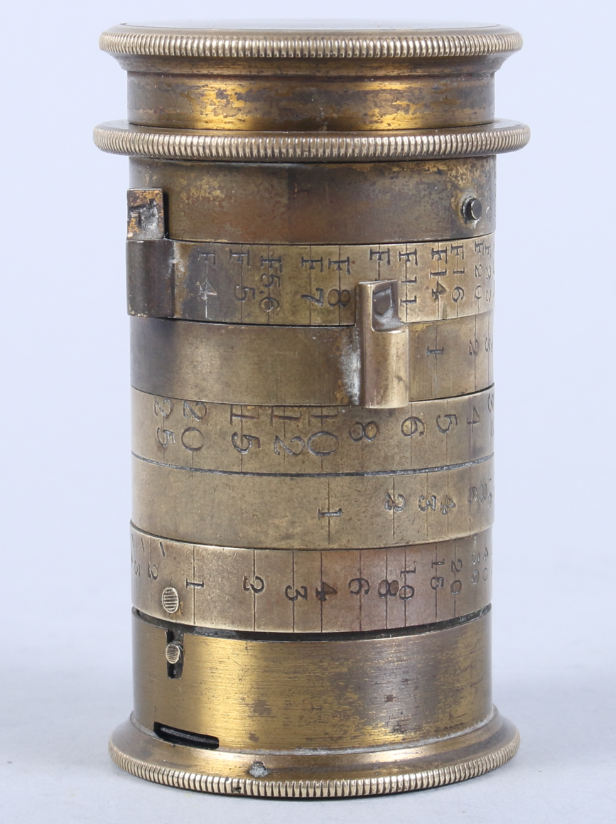 An early 20th century brass Watkins Exposure Meter, 2 1/2" long