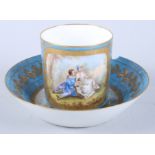 A Sevres porcelain coffee can, single panel decorated young lovers, gilt highlights on a blue