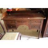 A 19th century tray-top washstand, fitted central drawer and two cupboards, on turned supports,