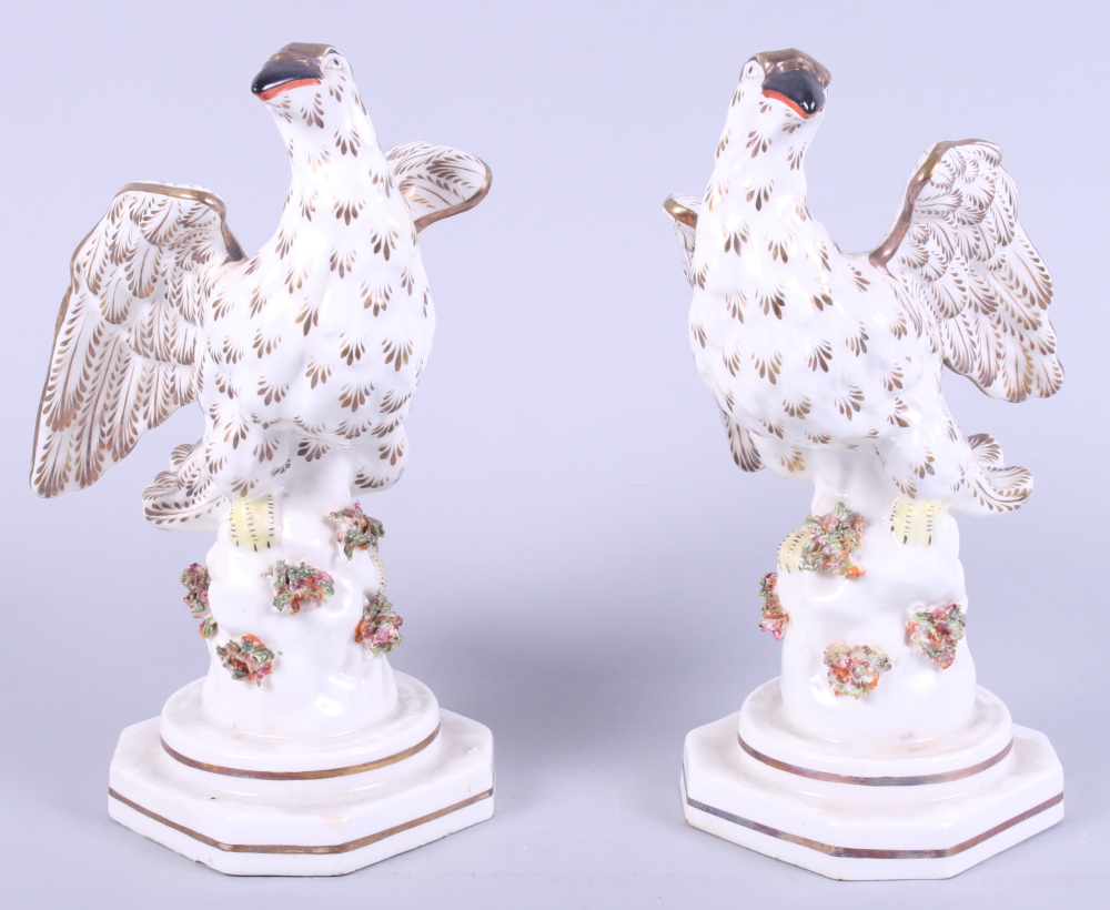 A pair of 19th century Staffordshire pottery eagles, 8" high