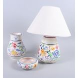A Poole pottery table lamp, together with two other pieces of Poole pottery