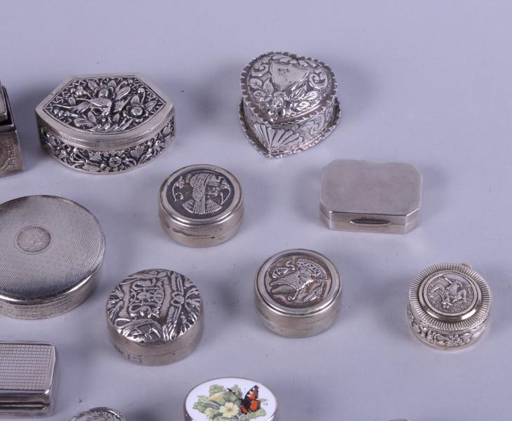 A collection of silver and white metal pill boxes, mostly with embossed decoration, 18.2oz troy - Image 4 of 5