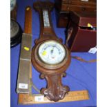 An oak cased aneroid barometer and thermometer, a rosewood workbox and contents, an inlaid box,