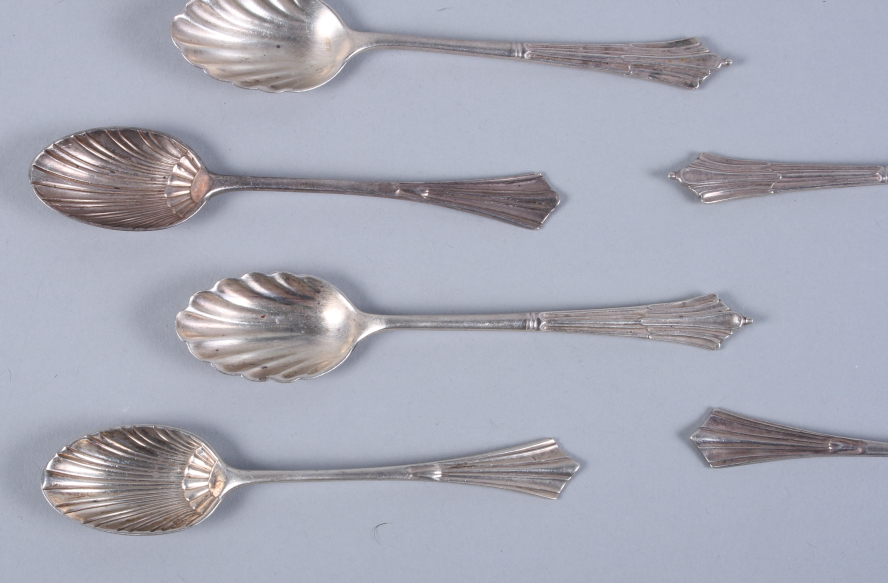 Two sets of four silver teaspoons, each with shell formed bowls, and a silver sugar scoop, 3.8oz - Image 2 of 6