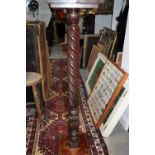 A 19th century spiral turned jardiniere stand, 40" high