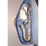 A Couesnon & Cie saxophone, in case