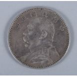 An early 20th century Chinese silver trade dollar, 1 1/2" dia, 0.8oz troy approx