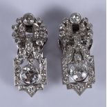 A pair of 18ct white gold Art Deco ear clips, set a combination of old cut, brilliant cut and