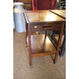 A mahogany drop leaf two-tier tea trolley