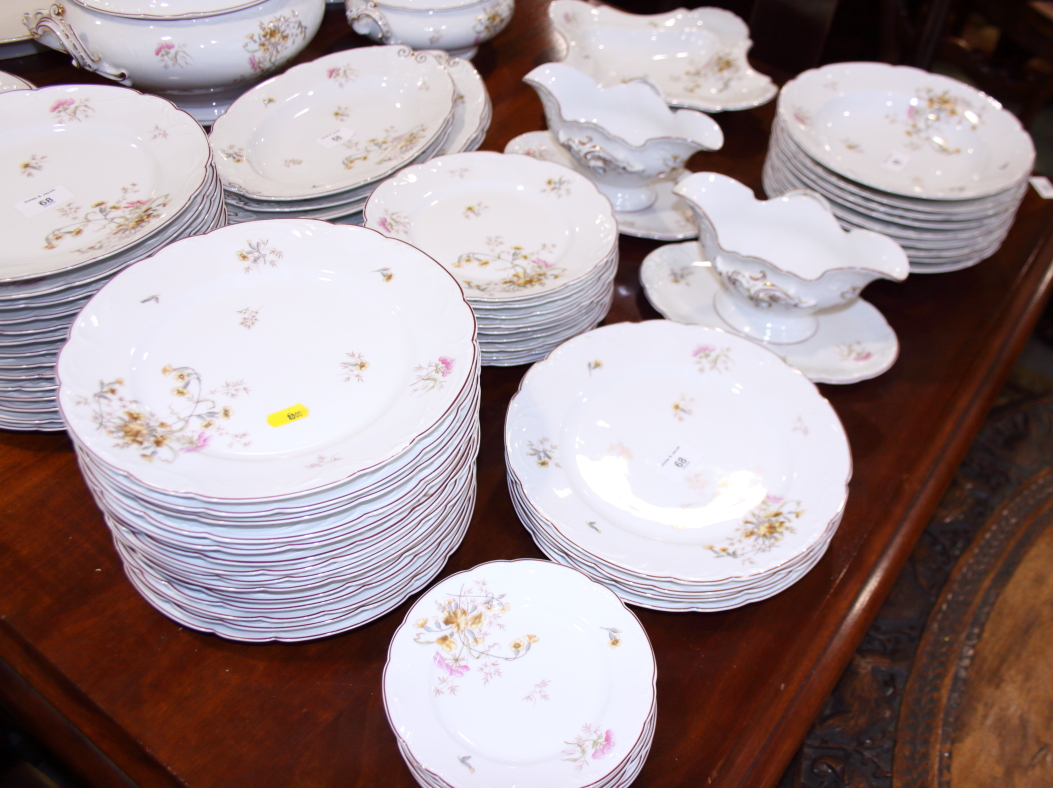 A Limoges porcelain floral and gilt decorated red bordered table service - Image 3 of 4