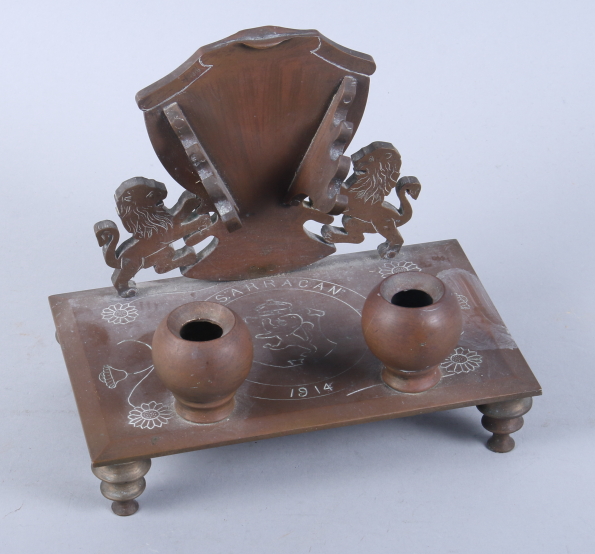 A bronze desk inkstand, inscribed SS Arracan 1914, 8" wide